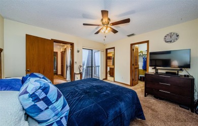 Under contract-accepting backup offers. NEW PRICE!! This warm on East Lake Woodlands Country Club in Florida - for sale on GolfHomes.com, golf home, golf lot