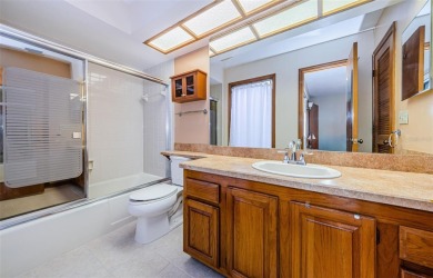 Under contract-accepting backup offers. NEW PRICE!! This warm on East Lake Woodlands Country Club in Florida - for sale on GolfHomes.com, golf home, golf lot