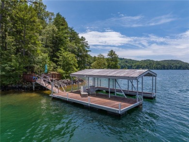 Positioned on one of Lake Keowee's most coveted point lots, this on The Cliffs At Keowee Vineyards Golf Club in South Carolina - for sale on GolfHomes.com, golf home, golf lot
