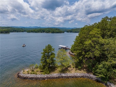 Positioned on one of Lake Keowee's most coveted point lots, this on The Cliffs At Keowee Vineyards Golf Club in South Carolina - for sale on GolfHomes.com, golf home, golf lot