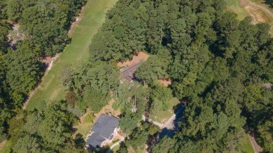 Nestled in the serene Houndslake North community, 1391 Woodbine on Houndslake Country Club in South Carolina - for sale on GolfHomes.com, golf home, golf lot
