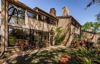 Under contract-accepting backup offers. NEW PRICE!! This warm on East Lake Woodlands Country Club in Florida - for sale on GolfHomes.com, golf home, golf lot