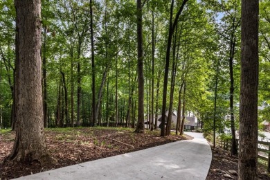 Discover your dream lake retreat on Lake Lanier with this on Crystal Falls Golf Club in Georgia - for sale on GolfHomes.com, golf home, golf lot