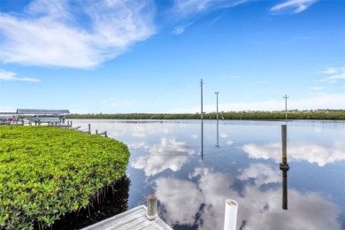 WATERFRONT LIFESTYLE! Outstanding views, boating, fishing, right on River Isles Golf Club in Florida - for sale on GolfHomes.com, golf home, golf lot