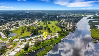 WATERFRONT LIFESTYLE! Outstanding views, boating, fishing, right on River Isles Golf Club in Florida - for sale on GolfHomes.com, golf home, golf lot