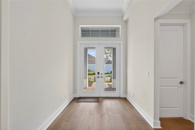 A 2022 Bermuda-inspired gem with sophisticated open living & on Oak Harbor Country Club in Florida - for sale on GolfHomes.com, golf home, golf lot