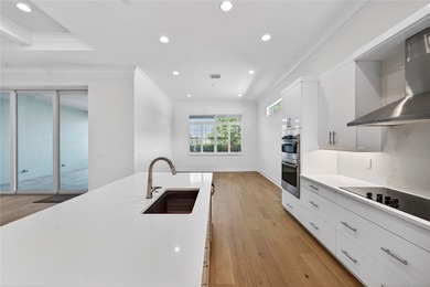 A 2022 Bermuda-inspired gem with sophisticated open living & on Oak Harbor Country Club in Florida - for sale on GolfHomes.com, golf home, golf lot