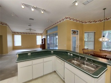 VERY POPULAR CAPISTRANO MODEL HOME on a great golf course lot on Royal Oaks Golf Club in Florida - for sale on GolfHomes.com, golf home, golf lot