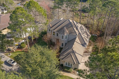 This distinguished custom-built residence is situated within the on Sandestin Golf and Beach Resort - Raven in Florida - for sale on GolfHomes.com, golf home, golf lot