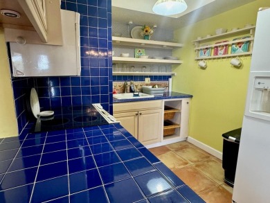 This 2nd-floor corner Riverhouse unit offers the perfect blend on Rotonda Golf and Country Club The Hills Course in Florida - for sale on GolfHomes.com, golf home, golf lot