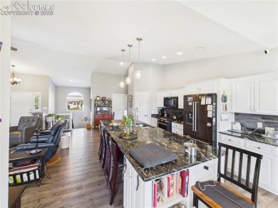 Welcome to this stunning ranch-style home overlooking the golf on Desert Hawk At Pueblo West in Colorado - for sale on GolfHomes.com, golf home, golf lot