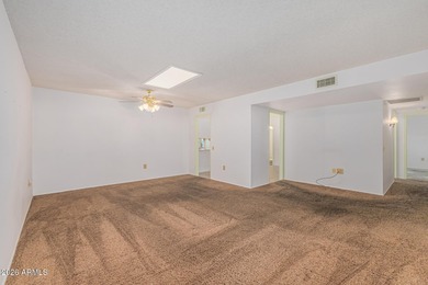 Welcome to this bright and charming end-unit garden condo in Sun on Pebblebrook Golf Course in Arizona - for sale on GolfHomes.com, golf home, golf lot