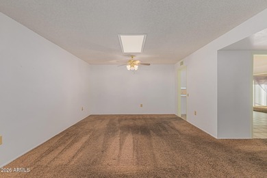 Welcome to this bright and charming end-unit garden condo in Sun on Pebblebrook Golf Course in Arizona - for sale on GolfHomes.com, golf home, golf lot