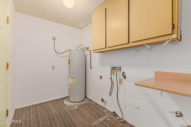 Welcome to this bright and charming end-unit garden condo in Sun on Pebblebrook Golf Course in Arizona - for sale on GolfHomes.com, golf home, golf lot