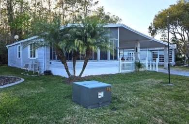 PLEASE NOTE: THIS HOME IS ON LEASED LAND IN A COMMUNITY WHERE on Big Cypress Golf and Country Club in Florida - for sale on GolfHomes.com, golf home, golf lot