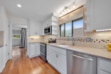 Beautifully updated end-unit townhouse in desirable Farmington on Farmington Woods Country Club in Connecticut - for sale on GolfHomes.com, golf home, golf lot