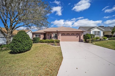 Welcome to this stunning TURNKEY DESIGNER Jasmine model home on The Links of Spruce Creek in Florida - for sale on GolfHomes.com, golf home, golf lot