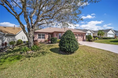 Welcome to this stunning TURNKEY DESIGNER Jasmine model home on The Links of Spruce Creek in Florida - for sale on GolfHomes.com, golf home, golf lot