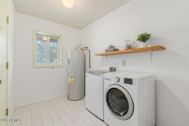 Welcome to this bright and charming end-unit garden condo in Sun on Pebblebrook Golf Course in Arizona - for sale on GolfHomes.com, golf home, golf lot