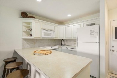 Enjoy relaxed resort-style living in this condo overlooking the on Ocean Village Golf Course in Florida - for sale on GolfHomes.com, golf home, golf lot