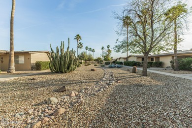 Welcome to this bright and charming end-unit garden condo in Sun on Pebblebrook Golf Course in Arizona - for sale on GolfHomes.com, golf home, golf lot