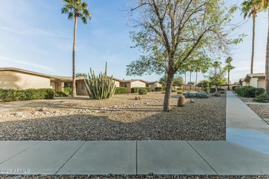 Welcome to this bright and charming end-unit garden condo in Sun on Pebblebrook Golf Course in Arizona - for sale on GolfHomes.com, golf home, golf lot