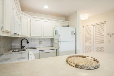Enjoy relaxed resort-style living in this condo overlooking the on Ocean Village Golf Course in Florida - for sale on GolfHomes.com, golf home, golf lot