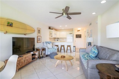 Enjoy relaxed resort-style living in this condo overlooking the on Ocean Village Golf Course in Florida - for sale on GolfHomes.com, golf home, golf lot