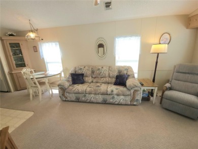 TWO BED, ONE BATH HOME IN ACTIVE 55+ COMMUNITY! This furnished on River Run Golf Links in Florida - for sale on GolfHomes.com, golf home, golf lot