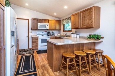 Discover this charming 2 bedroom, 2 bathroom ranch-style home on Skyline Golf Course in Wisconsin - for sale on GolfHomes.com, golf home, golf lot