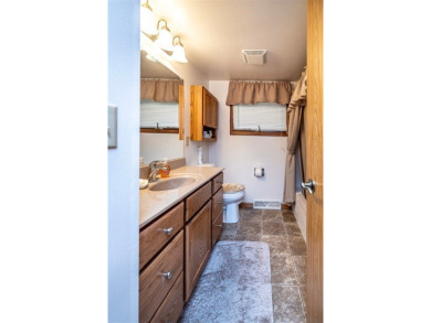 Discover this charming 2 bedroom, 2 bathroom ranch-style home on Skyline Golf Course in Wisconsin - for sale on GolfHomes.com, golf home, golf lot