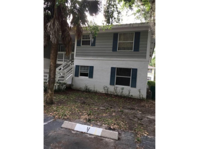 Calling All Investors!! This well-maintained 2-bedroom on Country Club At Silver Springs Shores in Florida - for sale on GolfHomes.com, golf home, golf lot