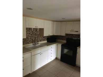 Calling All Investors!! This well-maintained 2-bedroom on Country Club At Silver Springs Shores in Florida - for sale on GolfHomes.com, golf home, golf lot