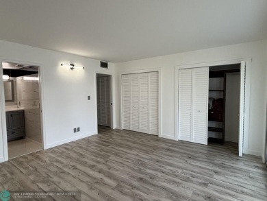 A stunning modern redesigned condo showcases impeccable on Wynmoor Golf Course in Florida - for sale on GolfHomes.com, golf home, golf lot