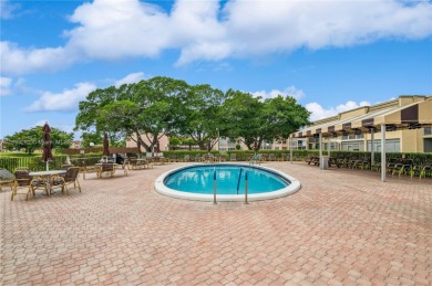 Beautiful 2 bed /2 bath condo with peaceful water views  from on Sunrise Lakes Phase III in Florida - for sale on GolfHomes.com, golf home, golf lot