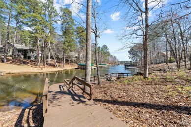 WELCOME TO 1020 TROUBLESOME CREEK LANE. THIS CHARMING LAKE on Reynolds Lake Oconee - The Oconee in Georgia - for sale on GolfHomes.com, golf home, golf lot