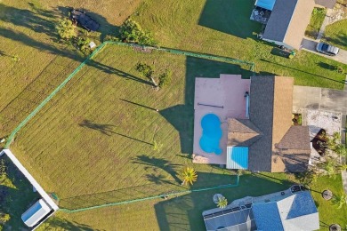 Under $300k for a pool home with double lot that is fenced...yes on Duffys Golf Center in Florida - for sale on GolfHomes.com, golf home, golf lot