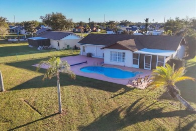 Under $300k for a pool home with double lot that is fenced...yes on Duffys Golf Center in Florida - for sale on GolfHomes.com, golf home, golf lot