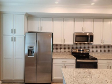 GOLF MEMBERSHIP FOR TWO IS INCLUDED AT HERITAGE LANDING GOLF & on Heritage Landing Golf  in Florida - for sale on GolfHomes.com, golf home, golf lot