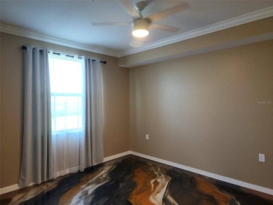 GOLF MEMBERSHIP FOR TWO IS INCLUDED AT HERITAGE LANDING GOLF & on Heritage Landing Golf  in Florida - for sale on GolfHomes.com, golf home, golf lot