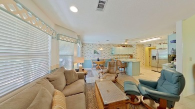 Nestled on the 3rd tee box, this beautifully designed 3-bedroom on Shalimar Pointe Golf and Country Club in Florida - for sale on GolfHomes.com, golf home, golf lot