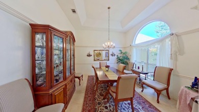Nestled on the 3rd tee box, this beautifully designed 3-bedroom on Shalimar Pointe Golf and Country Club in Florida - for sale on GolfHomes.com, golf home, golf lot