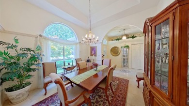 Nestled on the 3rd tee box, this beautifully designed 3-bedroom on Shalimar Pointe Golf and Country Club in Florida - for sale on GolfHomes.com, golf home, golf lot
