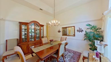 Nestled on the 3rd tee box, this beautifully designed 3-bedroom on Shalimar Pointe Golf and Country Club in Florida - for sale on GolfHomes.com, golf home, golf lot