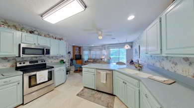 Nestled on the 3rd tee box, this beautifully designed 3-bedroom on Shalimar Pointe Golf and Country Club in Florida - for sale on GolfHomes.com, golf home, golf lot