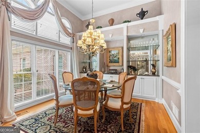 This exquisite four-sided blush brick estate is the epitome of on Royal Lakes Golf and Country Club in Georgia - for sale on GolfHomes.com, golf home, golf lot