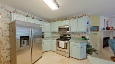 Nestled on the 3rd tee box, this beautifully designed 3-bedroom on Shalimar Pointe Golf and Country Club in Florida - for sale on GolfHomes.com, golf home, golf lot