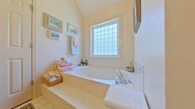 Nestled on the 3rd tee box, this beautifully designed 3-bedroom on Shalimar Pointe Golf and Country Club in Florida - for sale on GolfHomes.com, golf home, golf lot