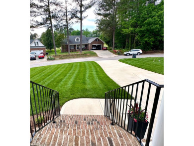 From the serene Golf Course setting to the quiet cul de sac on Henderson Country Club in North Carolina - for sale on GolfHomes.com, golf home, golf lot