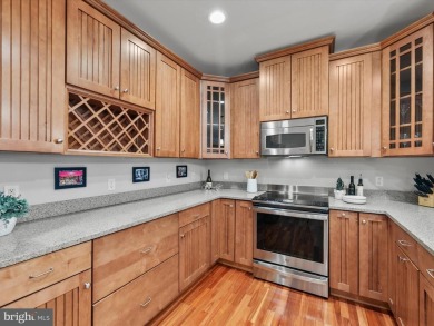 Beautiful three-bedroom, three full bath condominium showcasing on The Peninsula Golf and Country Club in Delaware - for sale on GolfHomes.com, golf home, golf lot